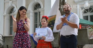 awarding-of-a-young-girl_310x161_crop_572aa0eb11